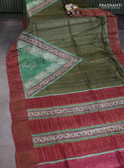 Pure tussar saree green and maroon with allover prints and zari woven border