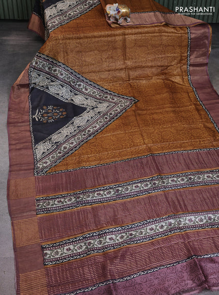 Pure tussar saree black and purple with allover prints and zari woven border