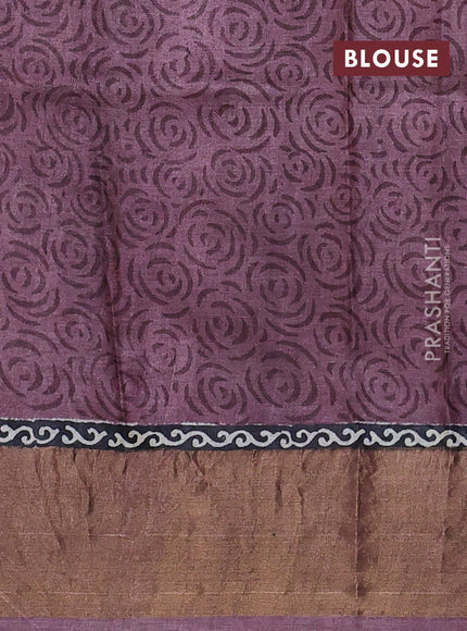 Pure tussar saree black and purple with allover prints and zari woven border