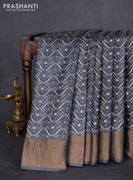 Pure tussar saree dark grey with allover prints and zari woven border