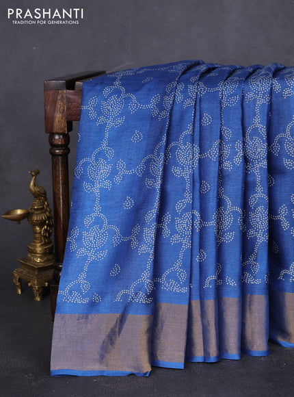 Pure tussar saree peacock blue with allover prints and zari woven border