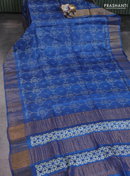 Pure tussar saree peacock blue with allover prints and zari woven border