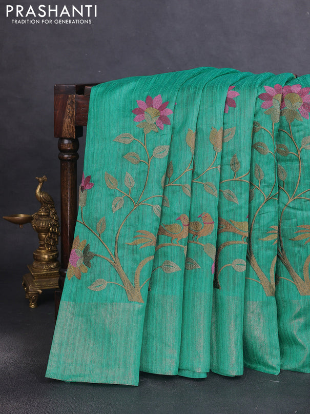 Matka tussar saree teal green with floral embroidery and zari woven border