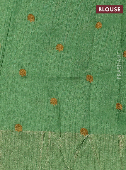 Matka tussar saree green with floral embroidery and zari woven border