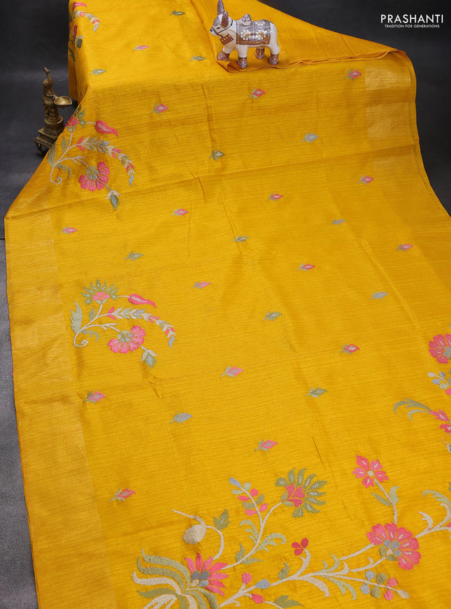 Matka tussar saree mustard yellow with floral embroidery and zari woven border