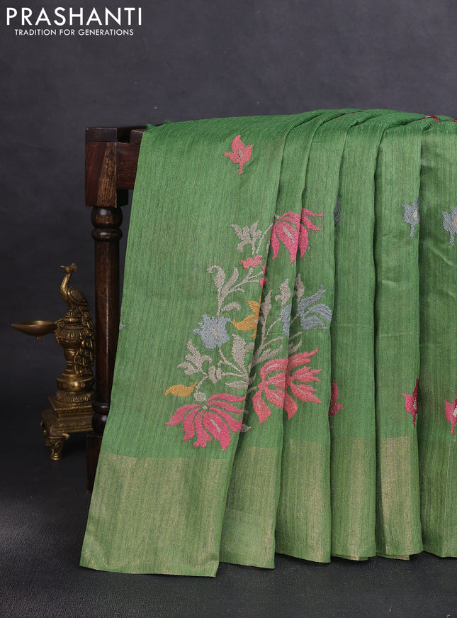 Matka tussar saree light green with floral embroidery and zari woven border