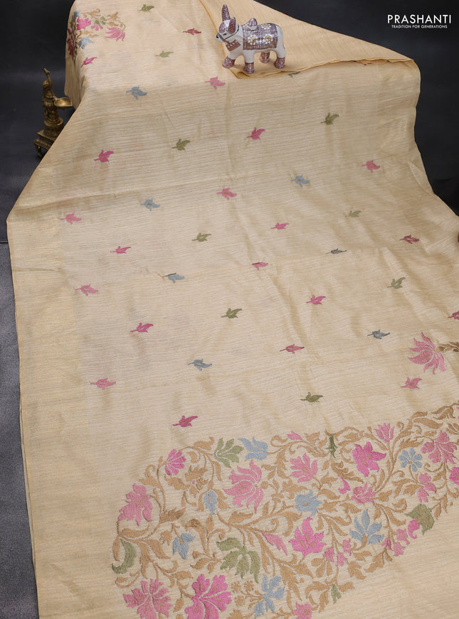 Matka tussar saree sandal with floral embroidery and zari woven border