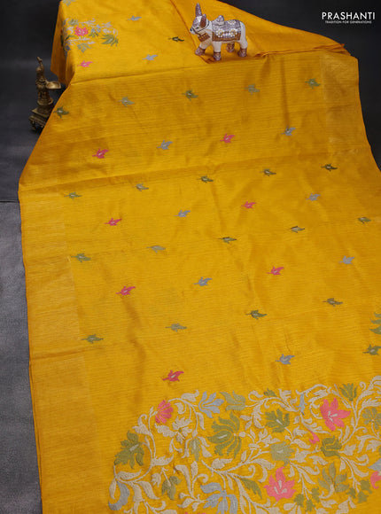 Matka tussar saree mustard yellow with floral embroidery and zari woven border