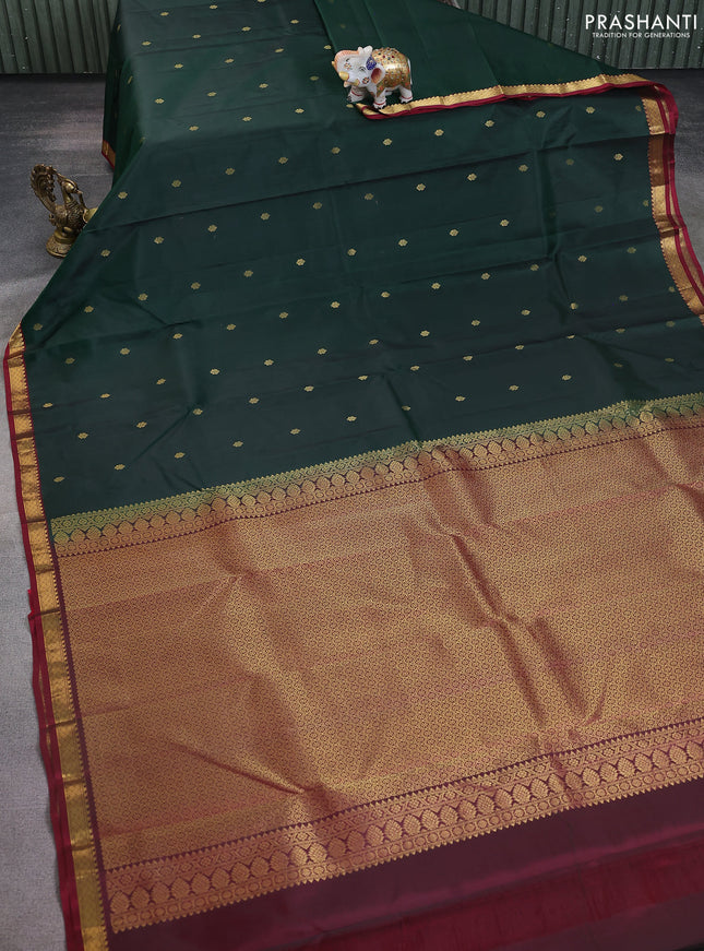 Pure kanchipuram silk saree bottle green and wine shade with zari woven buttas and zari woven border