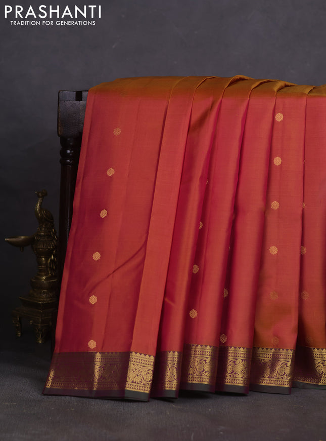 Pure kanchipuram silk saree dual shade of pink and green with allover zari woven buttas and rich zari woven border
