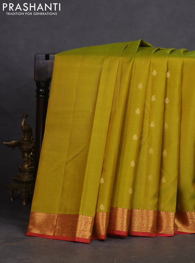 Pure kanchipuram silk saree light green shade and pink with allover zari woven buttas and rich zari woven border