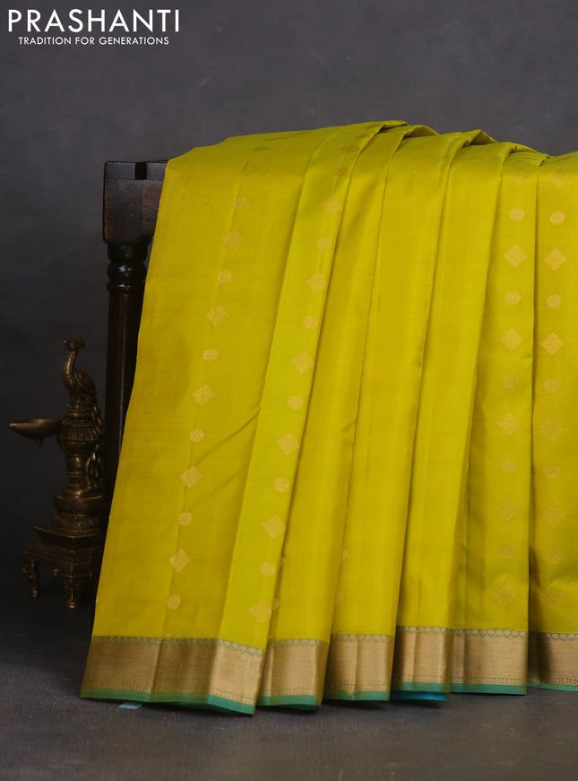 Pure kanchipuram silk saree lime yellow and teal green with allover zari woven buttas and rich zari woven border