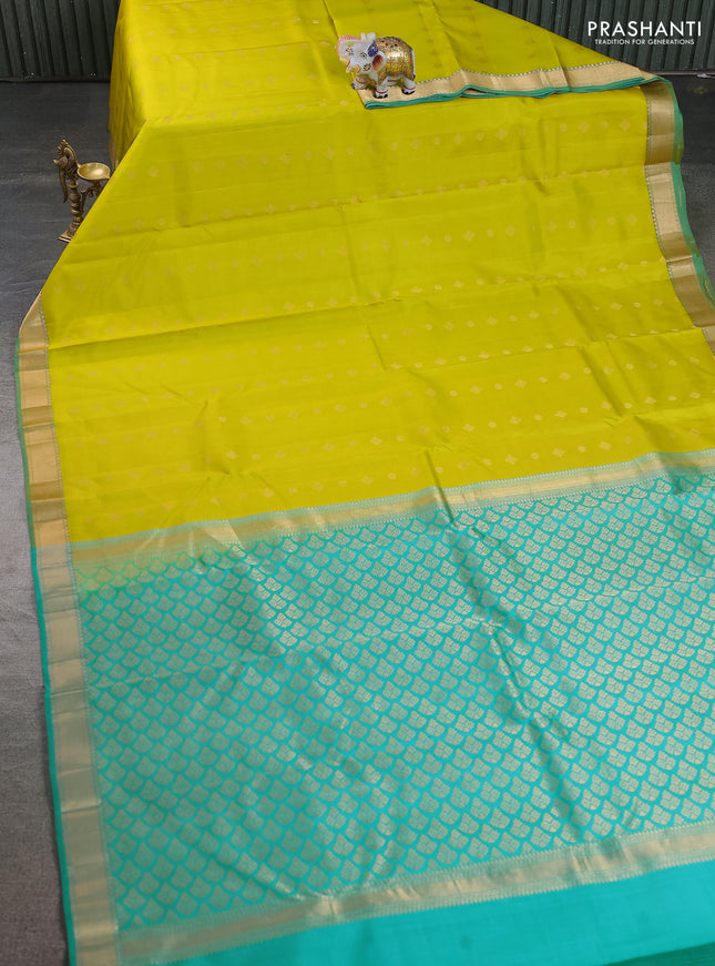 Pure kanchipuram silk saree lime yellow and teal green with allover zari woven buttas and rich zari woven border
