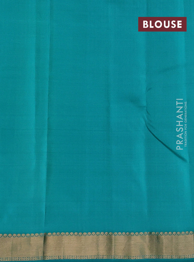 Pure kanchipuram silk saree dual shade of light green and teal green shade with allover zari woven buttas and rich zari woven border