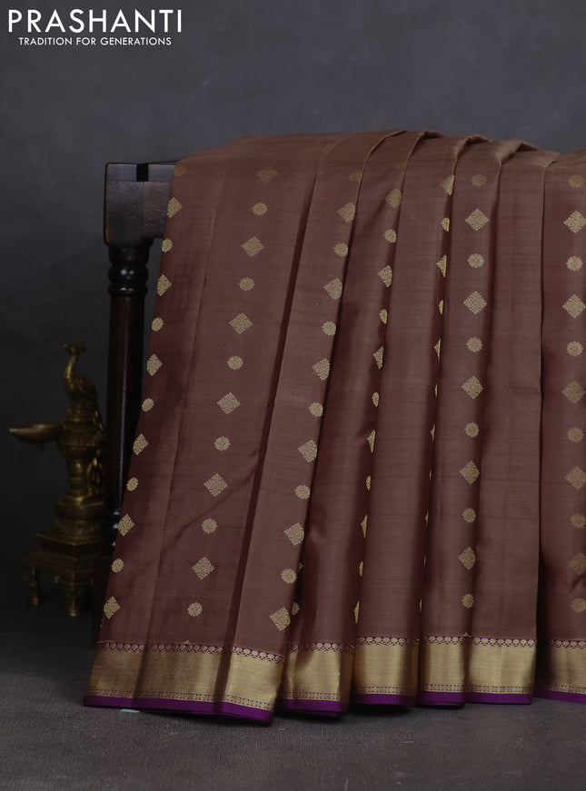 Pure kanchipuram silk saree pastel brown and purple with allover zari woven buttas and rich zari woven border
