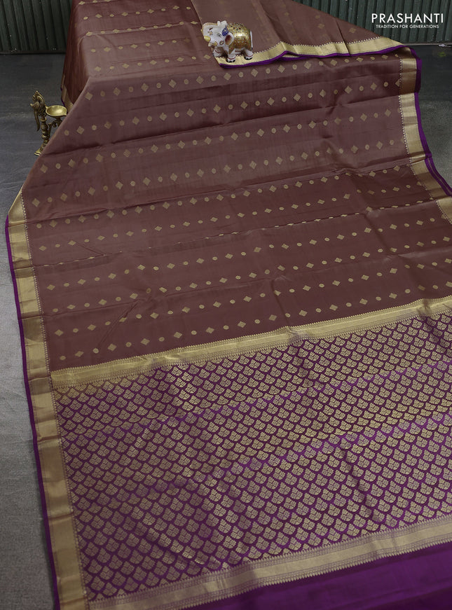 Pure kanchipuram silk saree pastel brown and purple with allover zari woven buttas and rich zari woven border