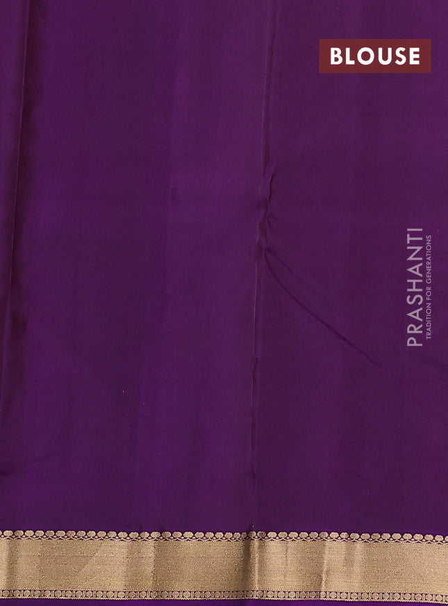 Pure kanchipuram silk saree pastel brown and purple with allover zari woven buttas and rich zari woven border