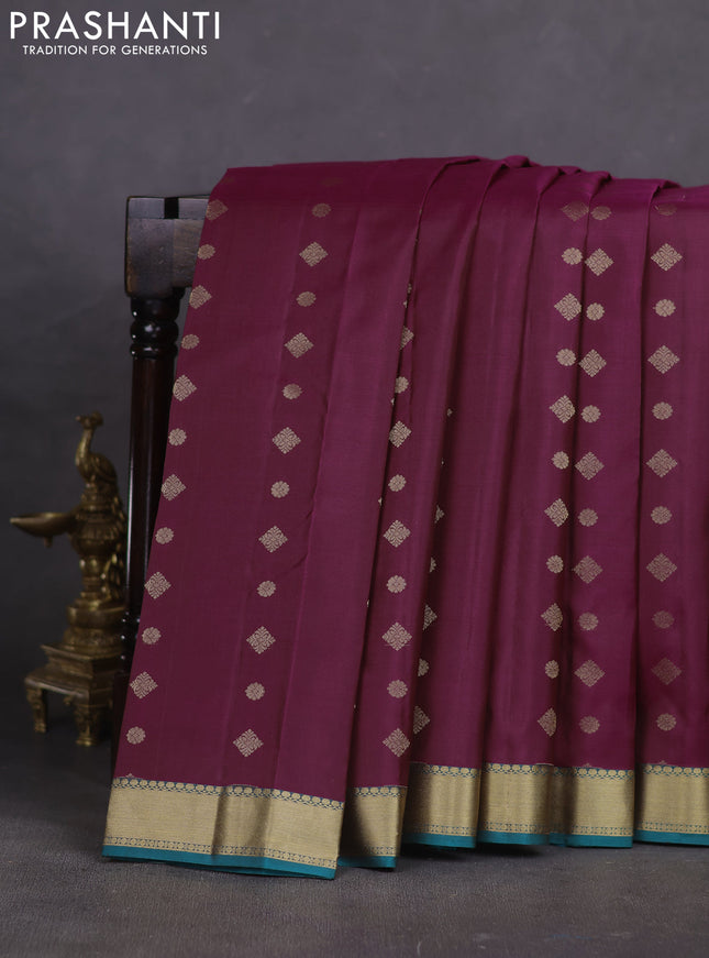 Pure kanchipuram silk saree dark magenta pink and teal green shade with allover zari woven buttas and rich zari woven border