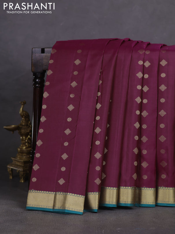 Pure kanchipuram silk saree dark magenta pink and teal green shade with allover zari woven buttas and rich zari woven border