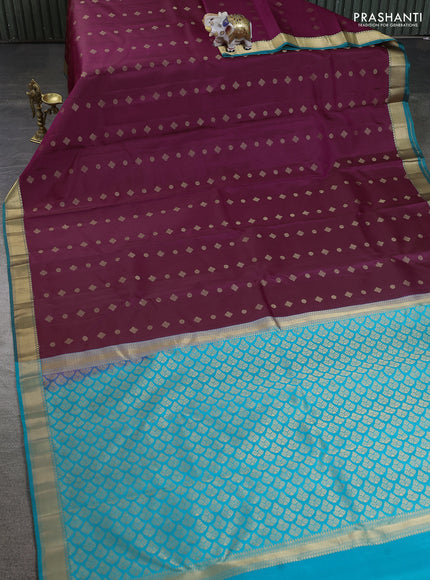 Pure kanchipuram silk saree dark magenta pink and teal green shade with allover zari woven buttas and rich zari woven border