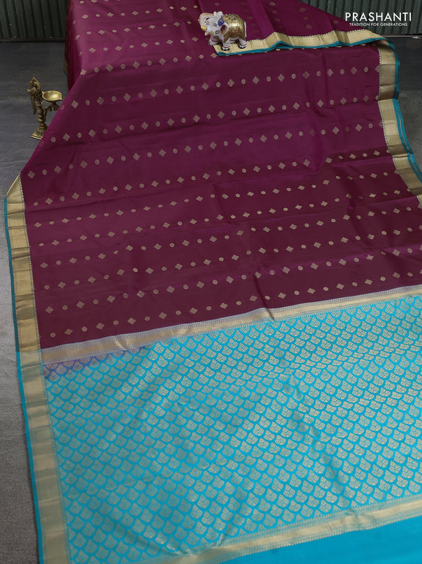 Pure kanchipuram silk saree dark magenta pink and teal green shade with allover zari woven buttas and rich zari woven border