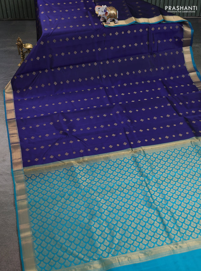 Pure kanchipuram silk saree navy blue and teal green shade with allover zari woven buttas and rich zari woven border