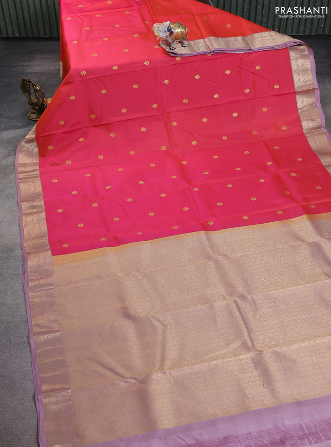 Pure kanchipuram silk saree dual shade of pink and mauve pink with zari woven buttas and rich zari woven korvai border