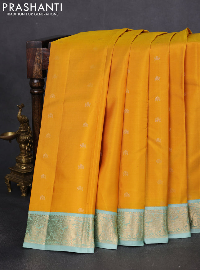 Pure kanchipuram silk saree yellow and pastel green with zari woven buttas and rich zari woven korvai border