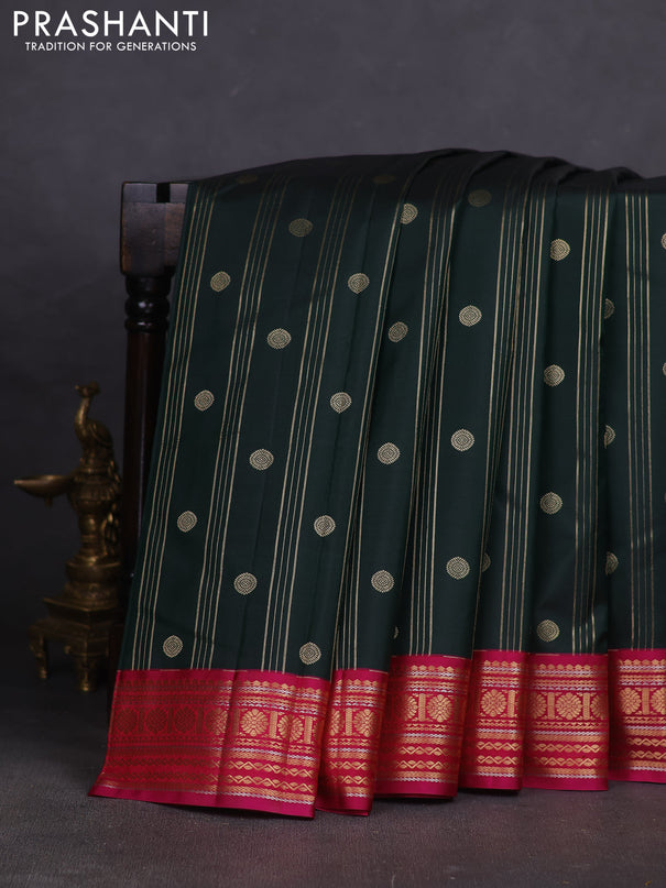 Pure kanchipuram silk saree bottle green and pink with allover zari weaves & buttas and rich zari woven korvai border