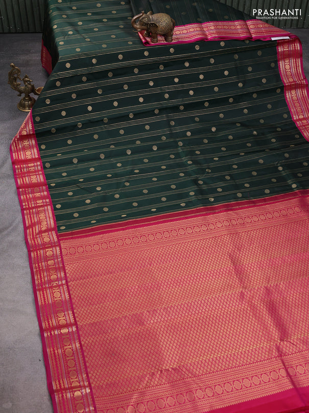 Pure kanchipuram silk saree bottle green and pink with allover zari weaves & buttas and rich zari woven korvai border