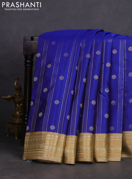 Pure kanchipuram silk saree blue and sandal with allover zari weaves & buttas and rich zari woven korvai border