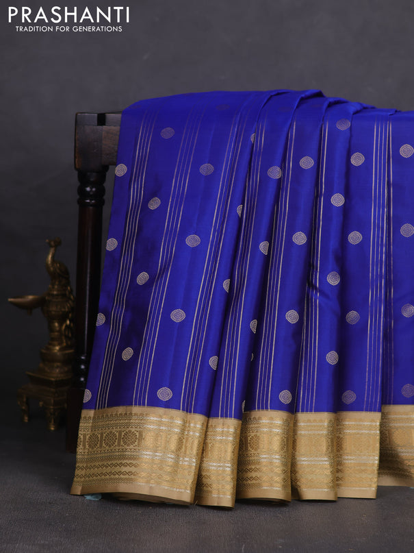 Pure kanchipuram silk saree blue and sandal with allover zari weaves & buttas and rich zari woven korvai border