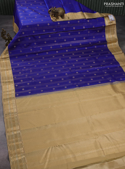 Pure kanchipuram silk saree blue and sandal with allover zari weaves & buttas and rich zari woven korvai border