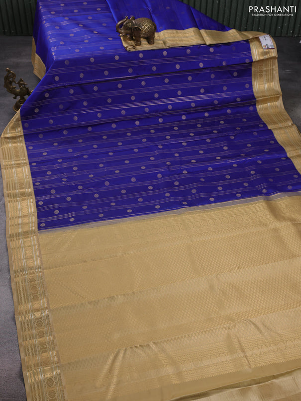 Pure kanchipuram silk saree blue and sandal with allover zari weaves & buttas and rich zari woven korvai border