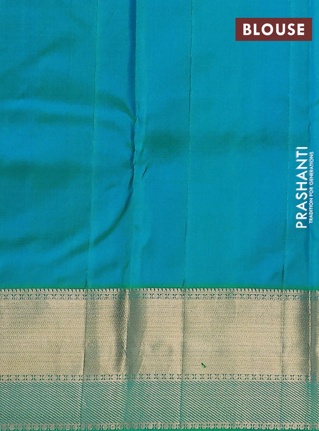 Pure kanchipuram silk saree dual shade of green with allover silver & gold zari weaves and rich zari woven border