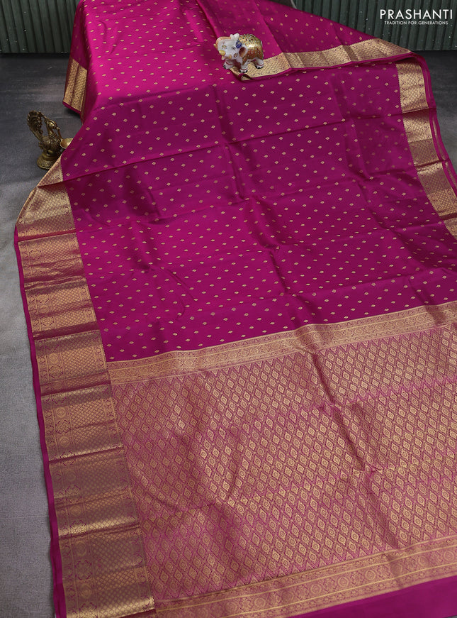 Pure kanchipuram silk saree magenta pink with allover zari woven buttas and zari woven border