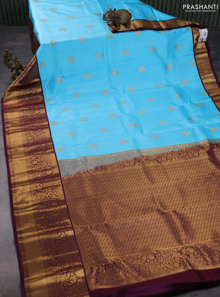 Pure kanchipuram silk saree teal blue and deep maroon with allover zari woven buttas and long zari woven border