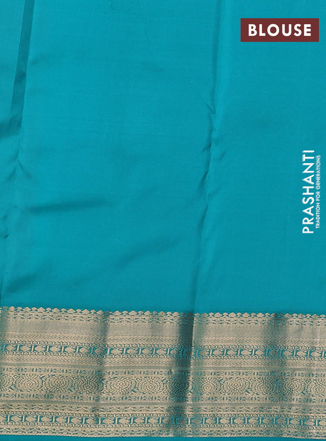 Pure kanchipuram silk saree dual shade of reddish pink and teal green with allover zari weaves & buttas and zari woven korvai border