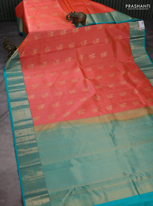 Pure kanchipuram silk saree orange and teal green with allover zari weaves & buttas and zari woven korvai border