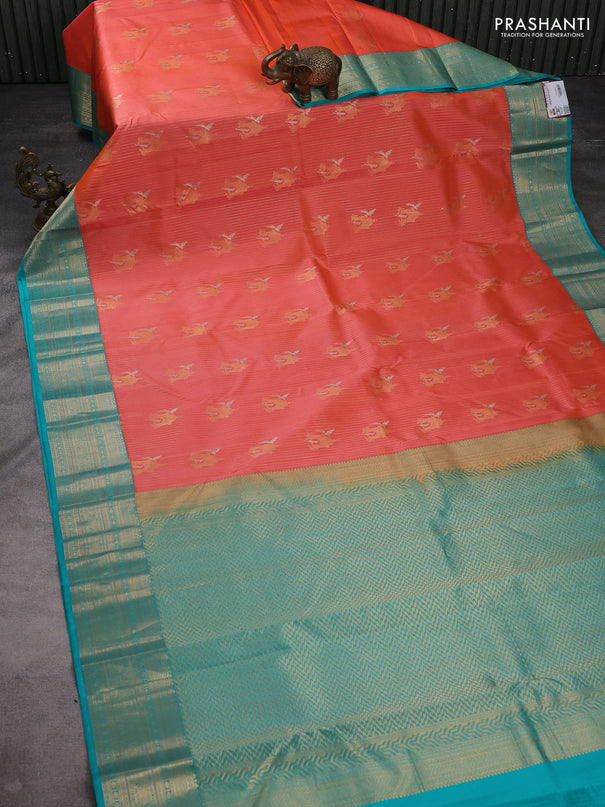 Pure kanchipuram silk saree orange and teal green with allover zari weaves & buttas and zari woven korvai border