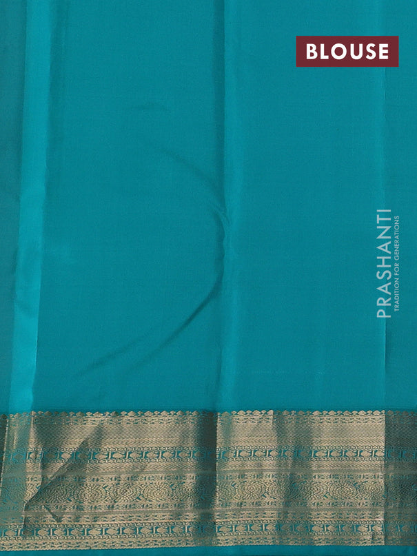 Pure kanchipuram silk saree orange and teal green with allover zari weaves & buttas and zari woven korvai border