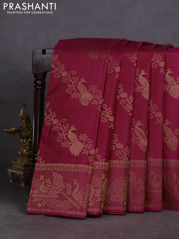 Pure kanchipuram silk saree magenta pink with allover peacock zari weaves and peacock zari woven border