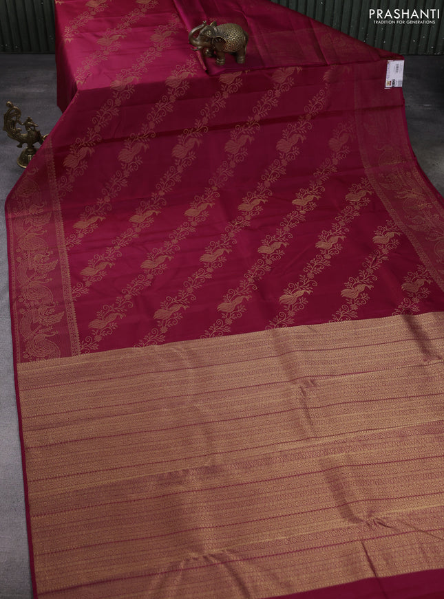 Pure kanchipuram silk saree magenta pink with allover peacock zari weaves and peacock zari woven border