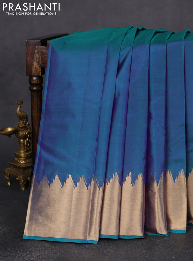 Pure kanchipuram silk saree teal green with plain body and rich temple zari woven border
