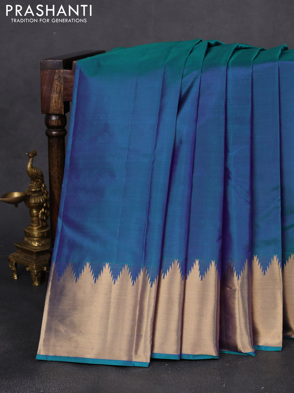 Pure kanchipuram silk saree teal green with plain body and rich temple zari woven border