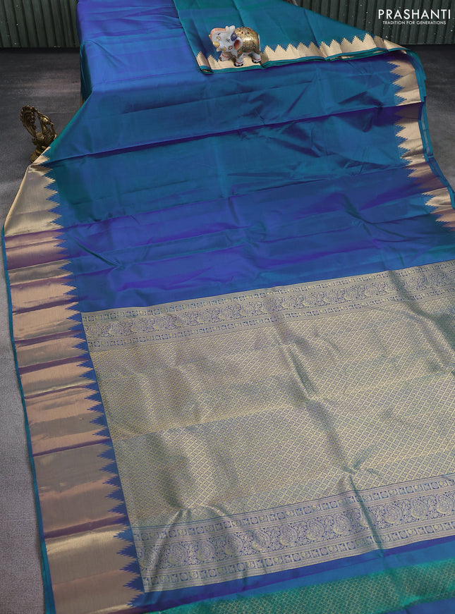 Pure kanchipuram silk saree teal green with plain body and rich temple zari woven border