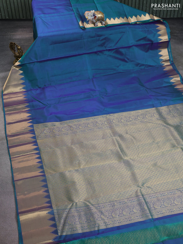 Pure kanchipuram silk saree teal green with plain body and rich temple zari woven border