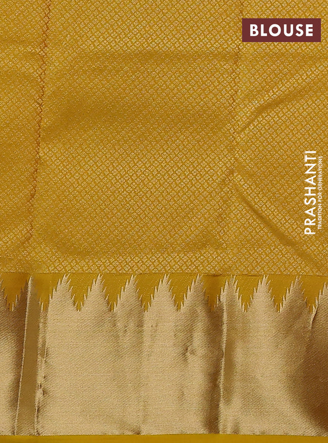 Pure kanchipuram silk saree yellow with plain body and rich temple zari woven border