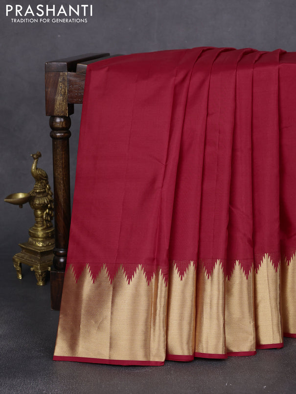 Pure kanchipuram silk saree red with plain body and rich temple zari woven border