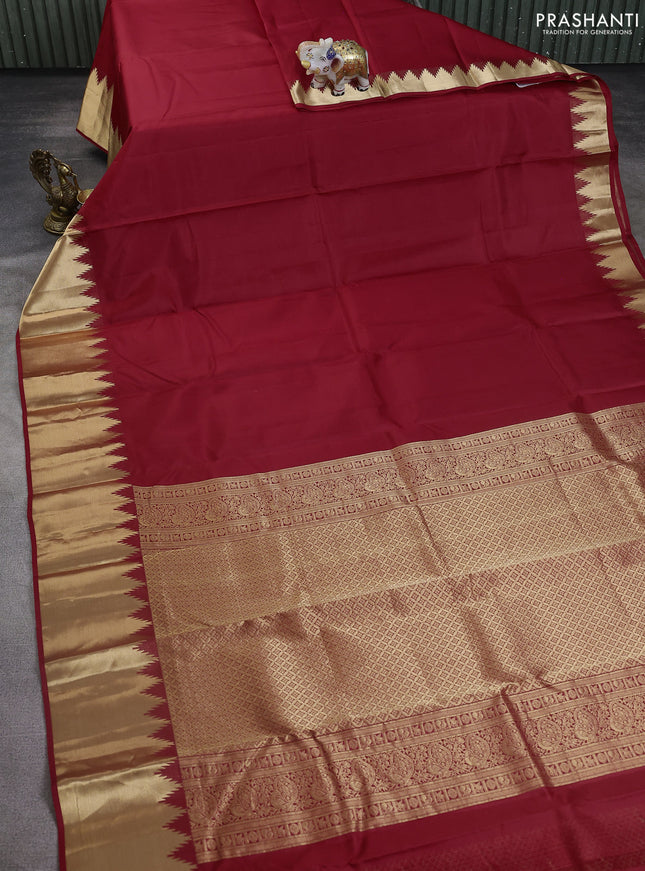 Pure kanchipuram silk saree red with plain body and rich temple zari woven border